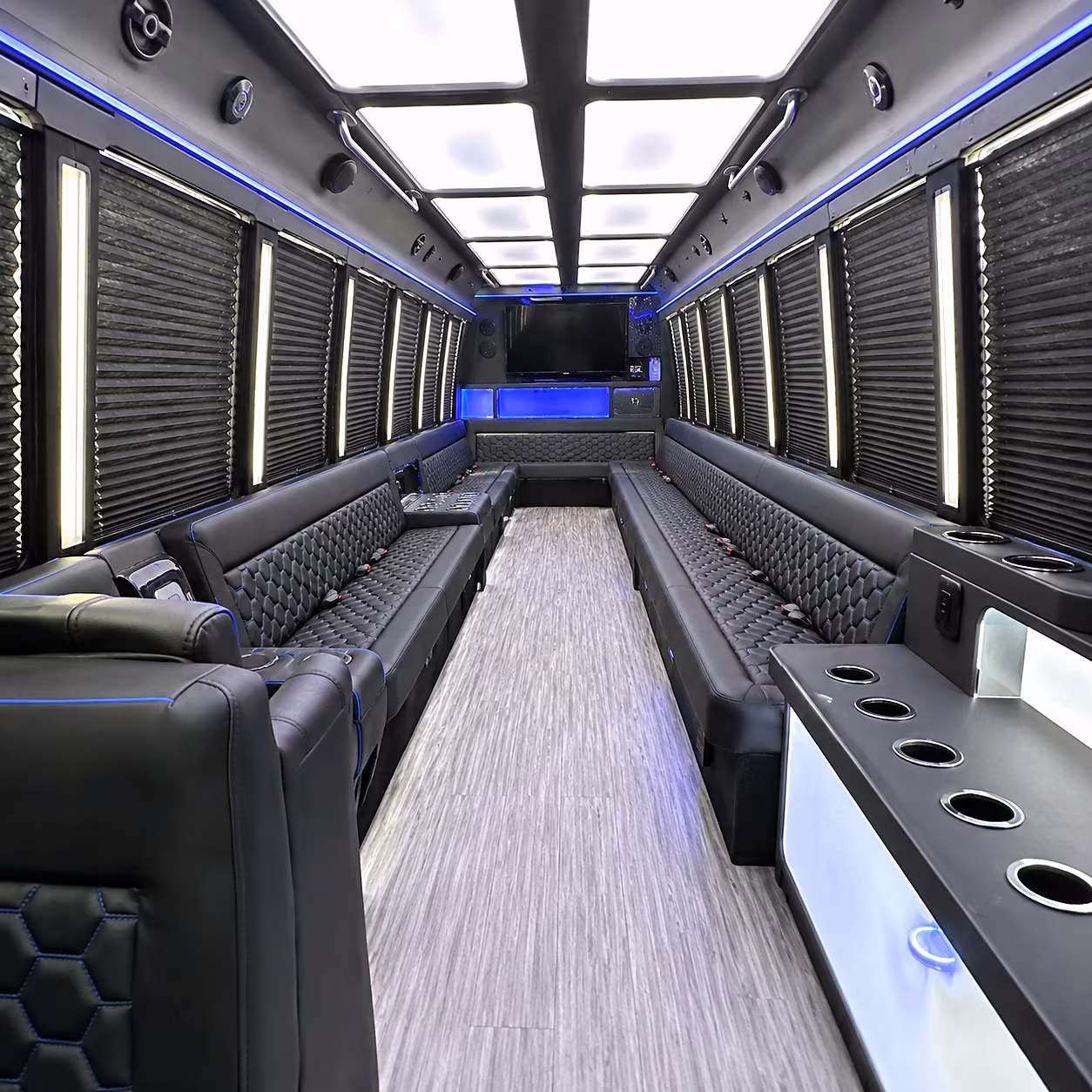 Wedding guests seated inside a party bus serving Topeka